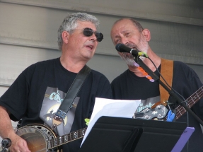 Burke and Peter playing banjo, guitar and singing