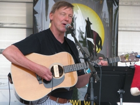 Eric playing guitar and singing