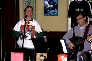 Grinning Eric on percussion, Mark playing guitar